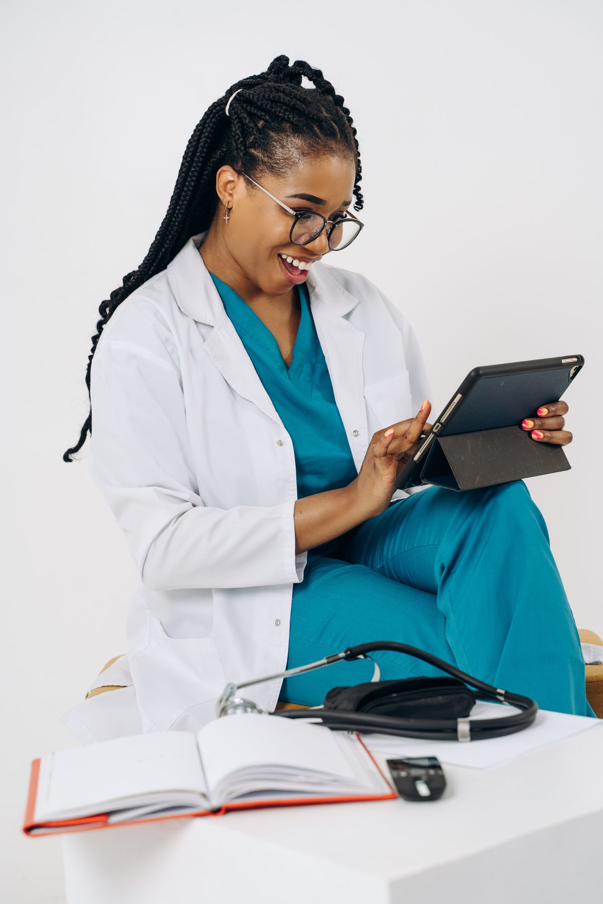 Provider reviewing a case on a tablet